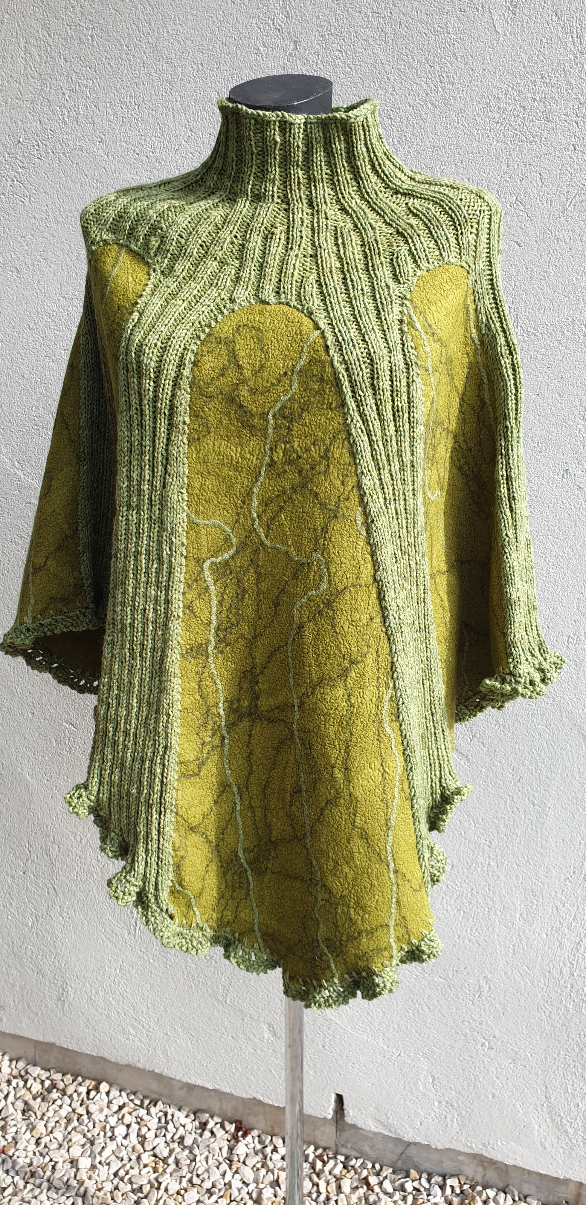 Grön poncho